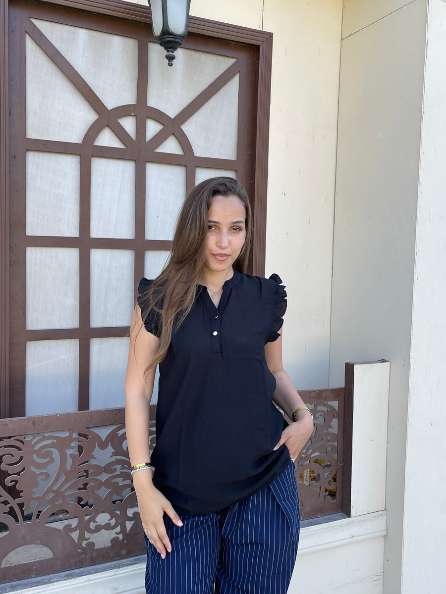 Black ruffle blouse